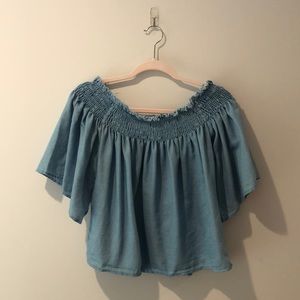 Blue off-the-shoulder blouse